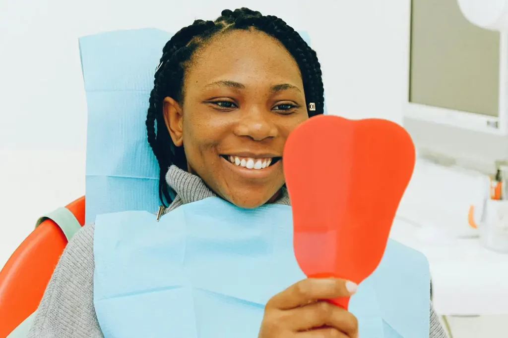 a smiling petient after dental Hygienist treatment