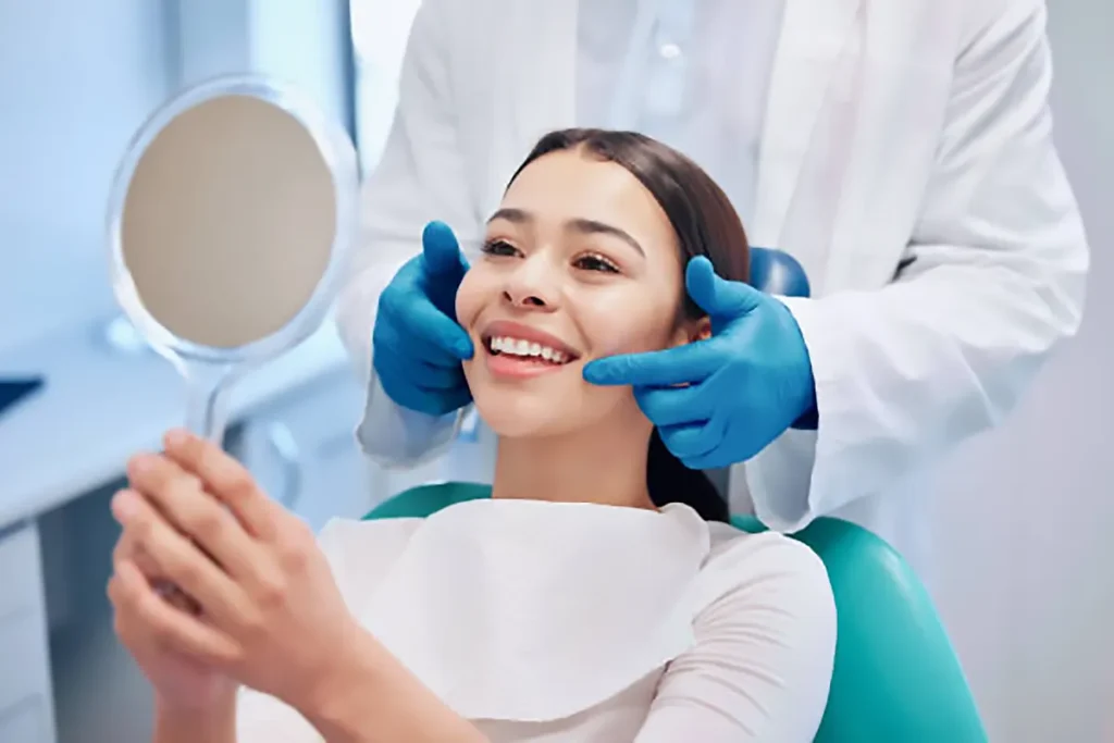 girl smilling after dental treatment in South Kensington