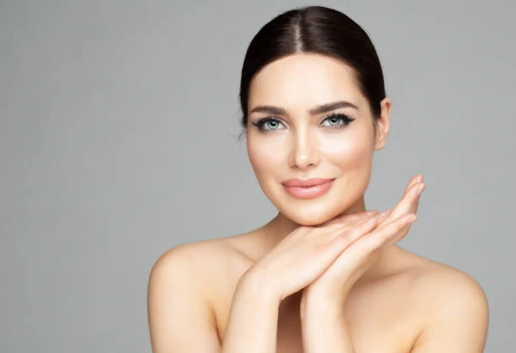 girl smilling after chin filler treatment